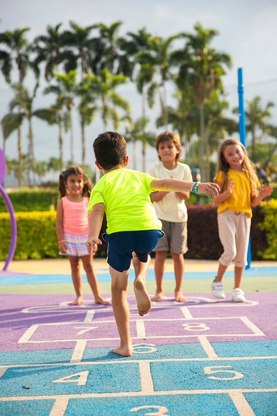 Kids Playing Hopscotch